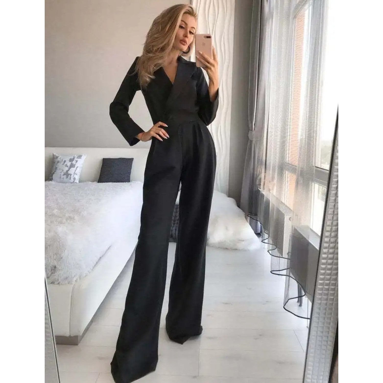 Dames jumpsuit met V-hals en lange mouwen