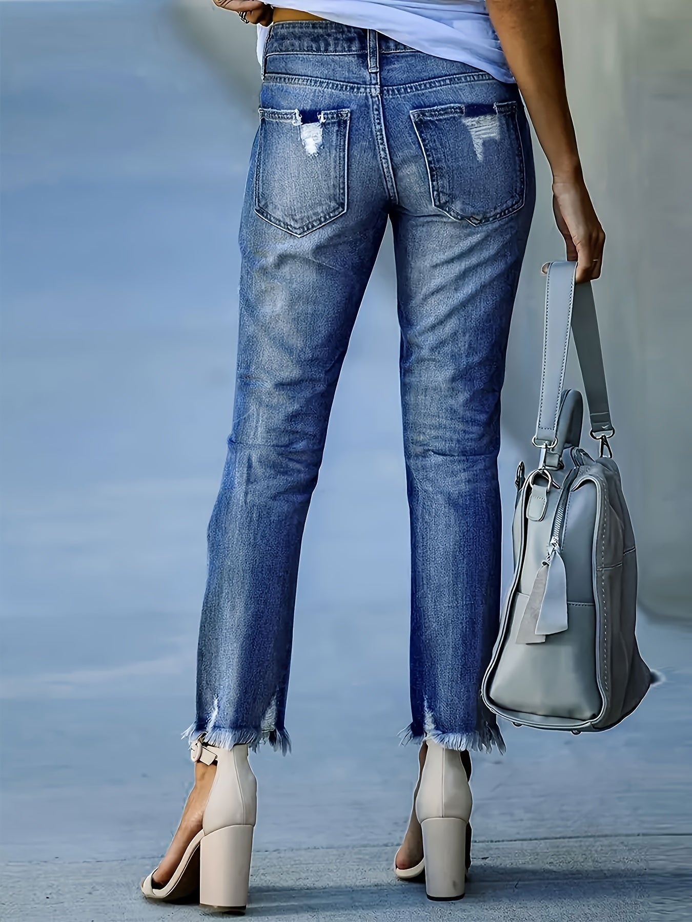 Dames skinny denim jeans met gescheurde details