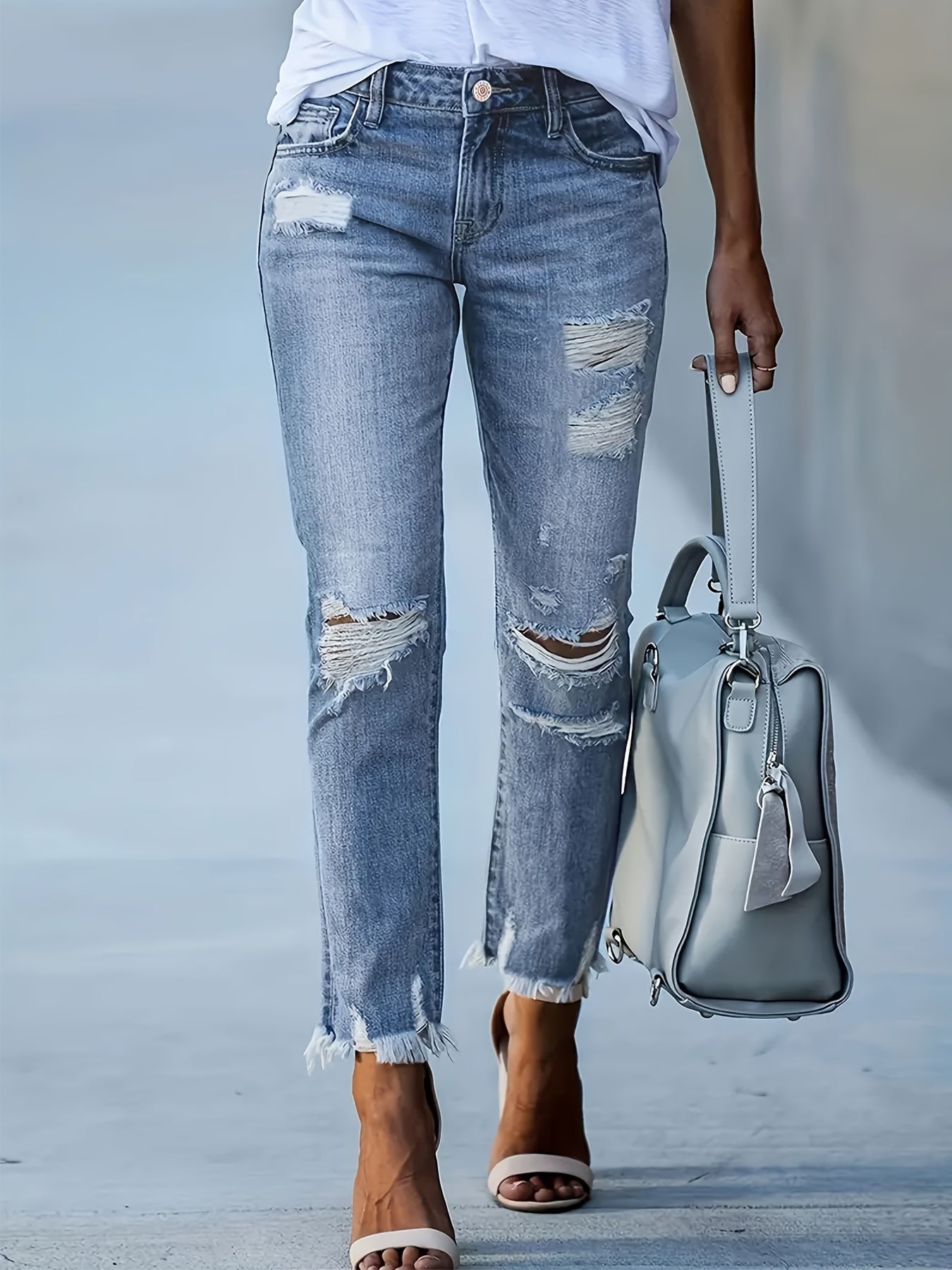 Dames skinny denim jeans met gescheurde details