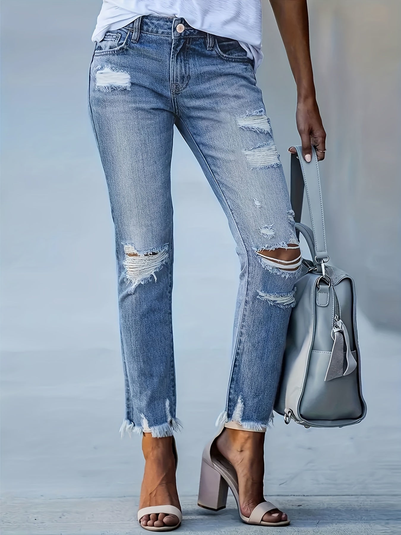 Dames skinny denim jeans met gescheurde details