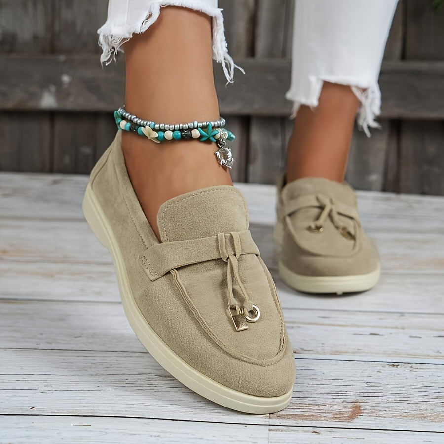 Dames suède loafers met strikdetail