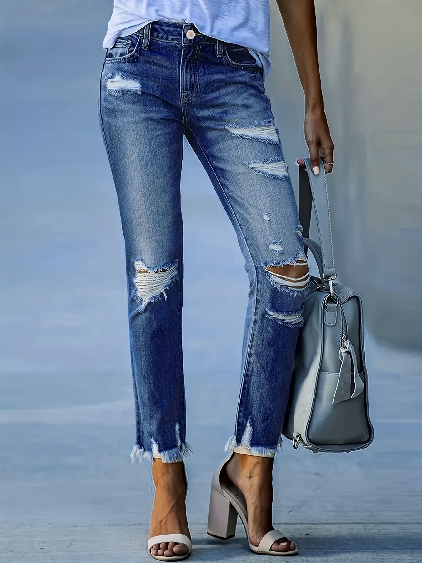 Dames skinny denim jeans met gescheurde details