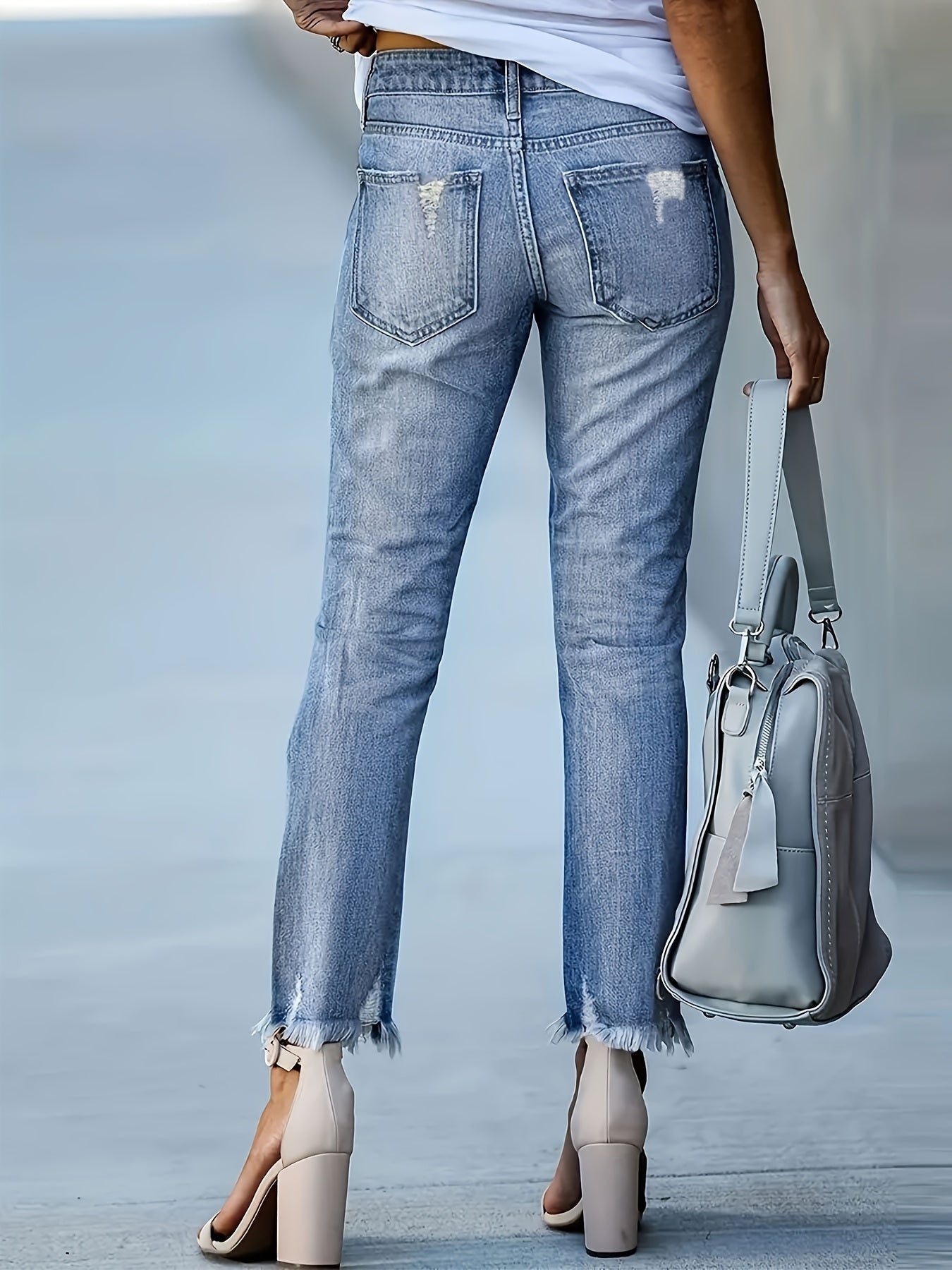 Dames skinny denim jeans met gescheurde details